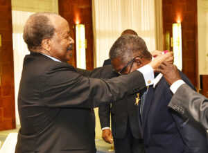 DSC2002: R-L:  President of the Republic of Cameroon, Paul Biya congratulating President/CE, Dangote Industries Limited, Aliko Dangote after conferment of “Commander of the National Order of Valour”  at  The Unity Palace, Yaoundé, Cameroon.