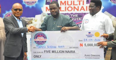 L-R: Group Managing Director, Dangote Industries Limited, Mr. Olakunle Alake, Star Winner, Mr. Mamza Joshua Abba, and the Regional Director North Central, Mr. George Bankole at the presentation of prizes to winners in the ongoing Dangote Cement Promo in Abuja...Tuesday.