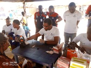Dr Iroro Yarhere , Managing Director, NiGrowth consults and services administering the Dangote Cement Malaria outreach in Edo state ...Thursday